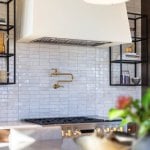 idology-–-casa-bonita-–-sprout-–-hendersonville-nc-–-custom-home-–-kitchen-zellige-backsplash-brass-pot-filler-range-–-11