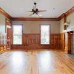 id-ology-fair-oaks-estate-renovation-living-room-knotty-pine-before-03