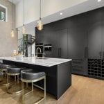idology-–-hidden-falls-–-kenmure-country-club-–-flat-rock-nc-–-custom-home-–-kitchen-dark-cabinetry-marble-island-bar-stools-–-13