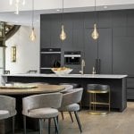 idology-–-hidden-falls-–-kenmure-country-club-–-flat-rock-nc-–-custom-home-–-kitchen-dark-cabinetry-marble-island-gold-pendants-–-11