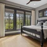 idology-modern-cottage-hideaway-custom-home-design-build-primary-bedroom-window-view-01
