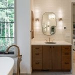 living-stone-design-build-modern-organic-elegance-the-ramble-biltmore-forest-nc-custom-home-primary-bath-vanity-tub-filler-detail-16