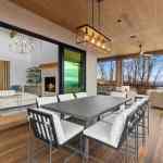 idology-–-overlook-escape-–-couch-mountain-–-fletcher-nc-–-custom-home-–-covered-deck-outdoor-dining-living-room-view-–-14