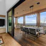 idology-–-overlook-escape-–-couch-mountain-–-fletcher-nc-–-custom-home-–-covered-deck-outdoor-dining-mountain-view-–-08