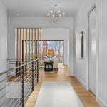 idology-–-overlook-escape-–-couch-mountain-–-fletcher-nc-–-custom-home-–-upper-hallway-stair-railing-living-room-view-–-07