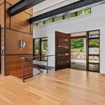 idology-–-southcliff-horizon-–-southcliff-–-fairview-nc-–-custom-home-–-entry-foyer-pivot-door-wood-panels-–-18