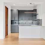 idology-–-southcliff-horizon-–-southcliff-–-fairview-nc-–-custom-home-–-kitchen-gray-cabinets-tile-backsplash-–-01