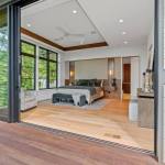 idology-–-southcliff-horizon-–-southcliff-–-fairview-nc-–-custom-home-–-primary-bedroom-deck-view-tray-ceiling-–-08