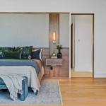 idology-–-southcliff-horizon-–-southcliff-–-fairview-nc-–-custom-home-–-primary-bedroom-upholstered-headboard-nightstand-–-09