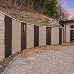 idology-–-stoneridge-haven-–-laurel-ridge-farms-–-waynesville-nc-–-custom-home-–-exterior-retaining-wall-driveway-sunset-–-04