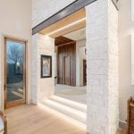 idology-–-stoneridge-haven-–-laurel-ridge-farms-–-waynesville-nc-–-custom-home-–-foyer-stone-arch-wood-ceiling-–-03