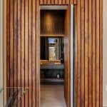 idology-–-stoneridge-haven-–-laurel-ridge-farms-–-waynesville-nc-–-custom-home-–-upper-hall-herringbone-wood-wall-stair-–-18