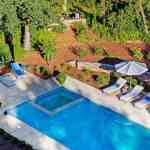 id-ology-–-the-arboretum-garden-house-–-biltmore-forest-–-asheville-nc-–-renovation-–-aerial-pool-loungers-umbrellas-patio-drone-–-16