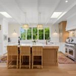 id-ology-–-the-arboretum-garden-house-–-biltmore-forest-–-asheville-nc-–-renovation-–-kitchen-island-rattan-counter-stools-skylights-–-08