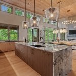 id-ology-–-waterfall-overlook-–-hendersonville-nc-–-custom-home-–-kitchen-island-open-living-room-stone-fireplace-–-04