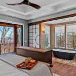 idology-zen-mountain-haven-high-hickory-mountain-swannanoa-nc-custom-home-primary-bedroom-soaking-tub-view-01